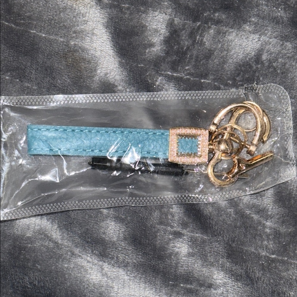 Elegant Blue Keychain with Gold Accents